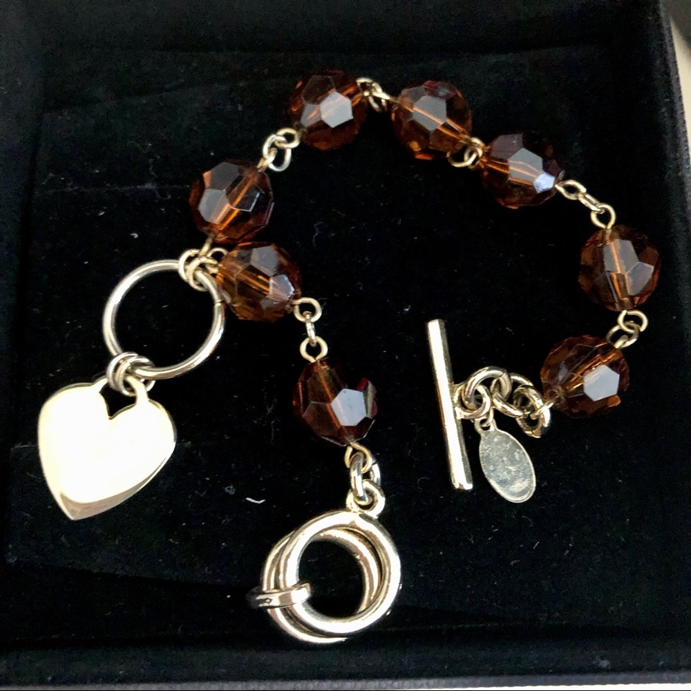 Gold toned and brown beaded bracelet